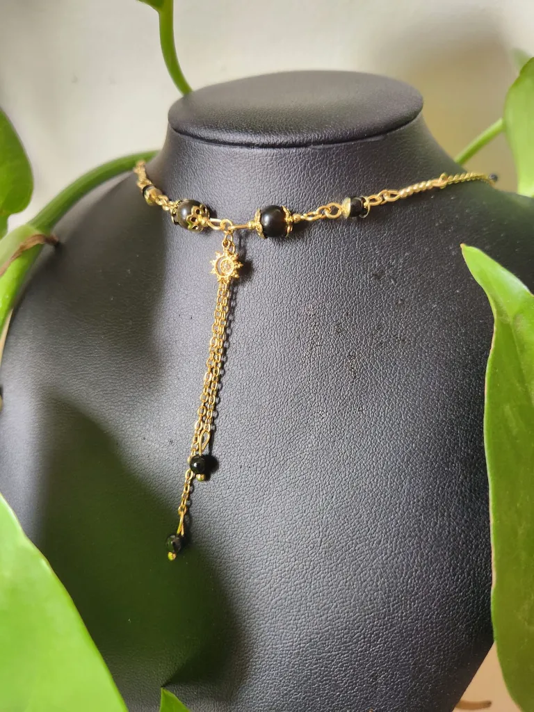 Minimaliste obsidienne dorée 3.webp